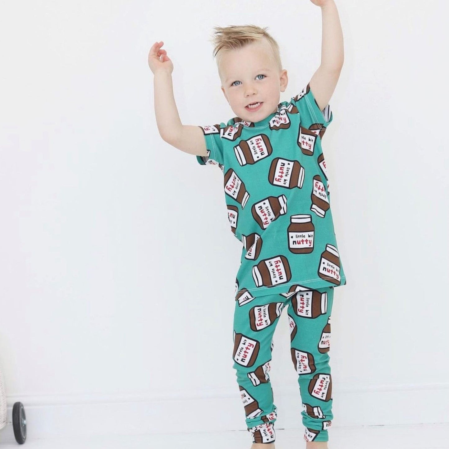 A child wearing the leggings and a matching t-shirt