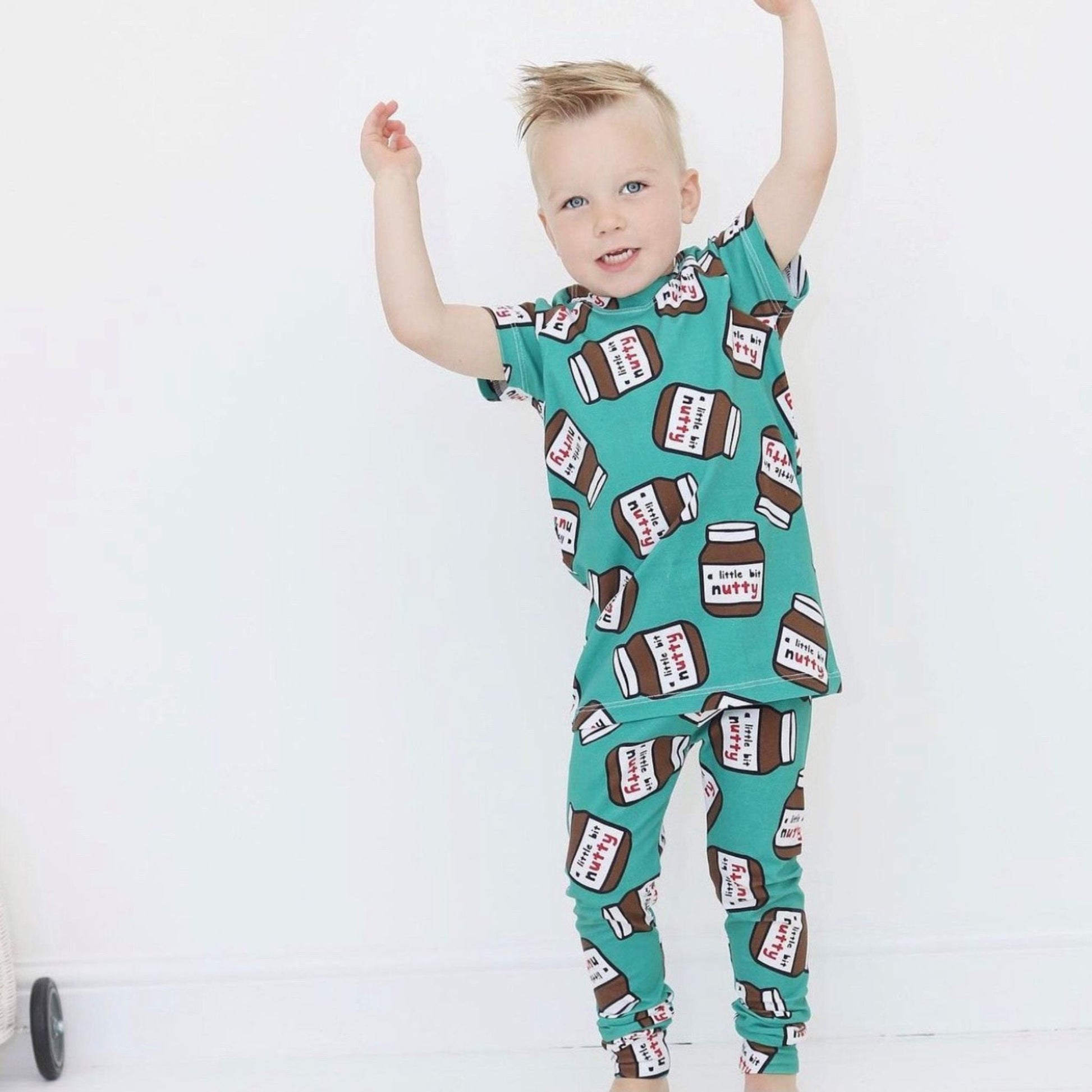 A child wearing the leggings and a matching t-shirt