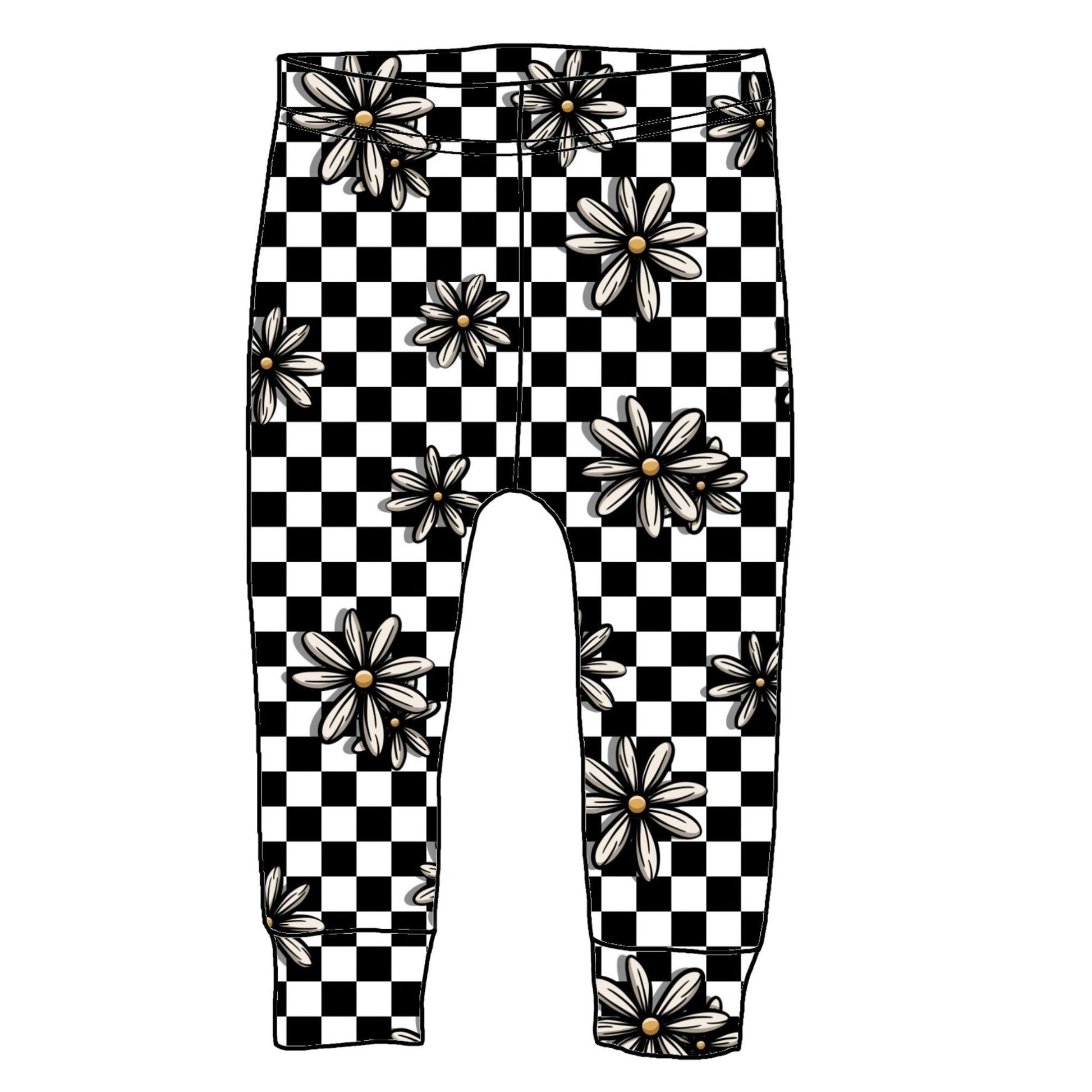 White and black checked leggings with images of daisy's on them.